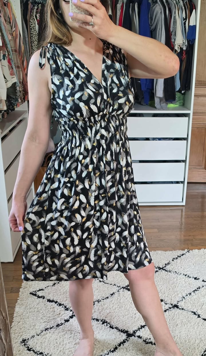ROBE MAGIQUE PLUMES NOIRE